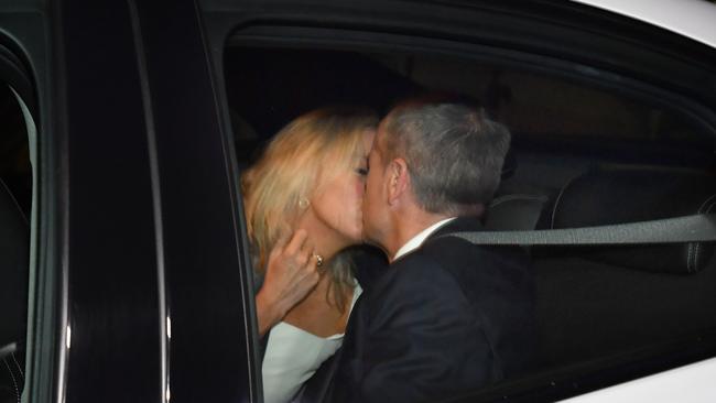 Australian Opposition Leader Bill Shorten kisses his wife Chloe Shorten after his win.