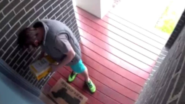 The man checked where the parcel came from before ripping it open. Photo: Victoria Police