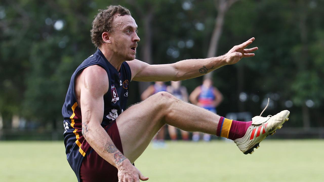 Lions' Brandon Lovell kicks the ball in the AFL Cairns Round 6 match between the Cairns City Lions and the Centrals Trinity Bulldogs, held at Holloways Beach. Picture: Brendan Radke