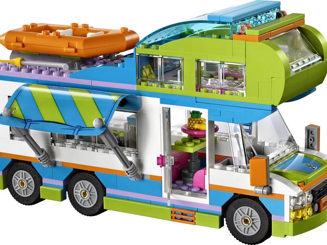 A Lego camper van, complete with friendly horse.