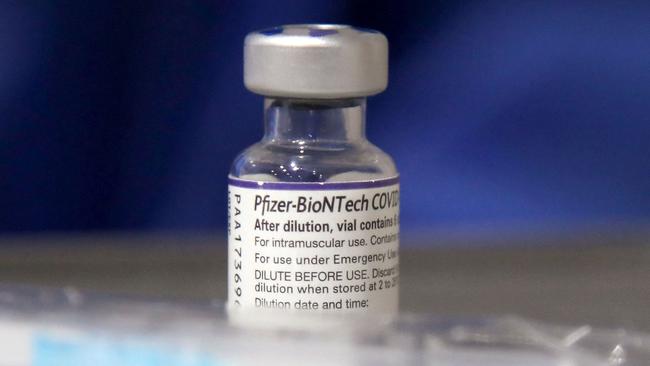 The Pfizer booster shot for teenagers is now awaiting the final green light from ATAGI. (Photo by Daniel MUNOZ / AFP)