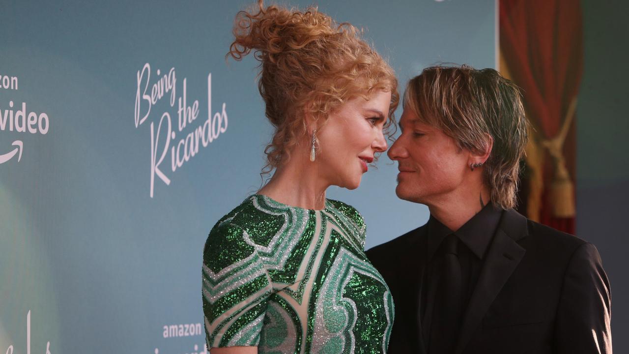 The loved-up pair shared a series of sweet moments on the red carpet. Picture: Lisa Maree Williams/Getty Images