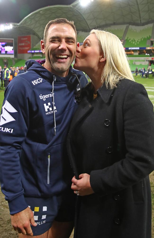 Smith is kissed by his wife Barbara after his 400th NRL game. Picture: Scott Barbour