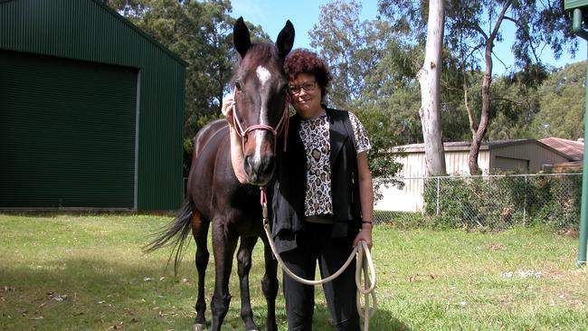 Author Gillian Wills with Elvis at her property in Ransome.