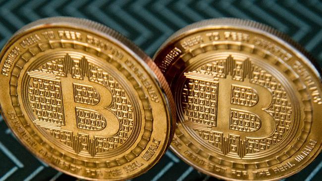 On global markets, the value of listed ETFs based on gold and Bitcoin are broadly similar. Picture: AFP