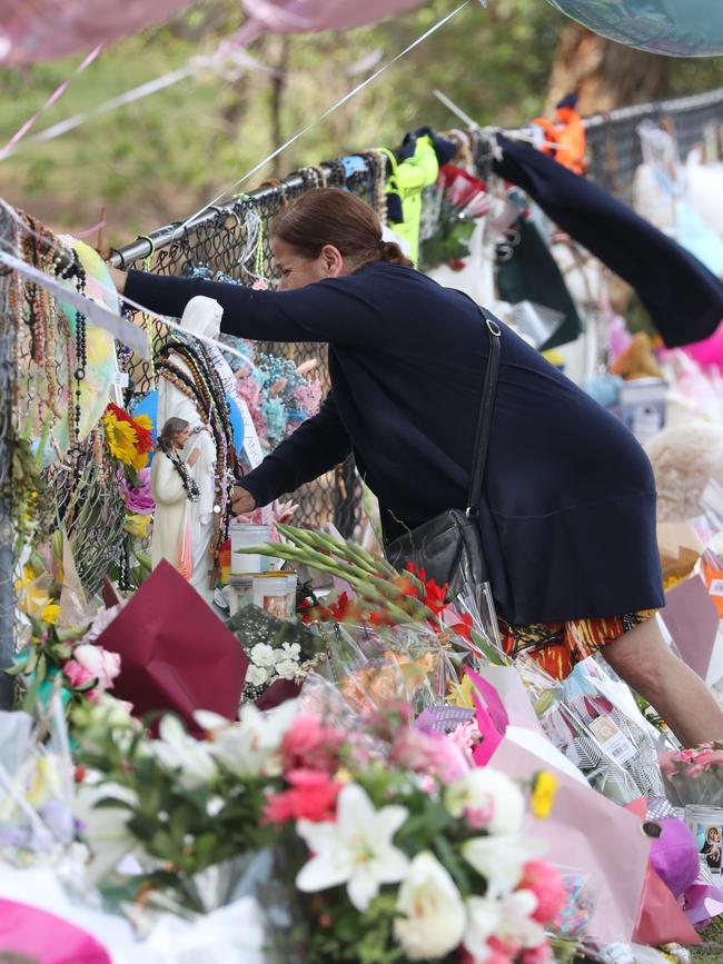 Mrs Abdallah reads messages of support. Pictures: John Grainger