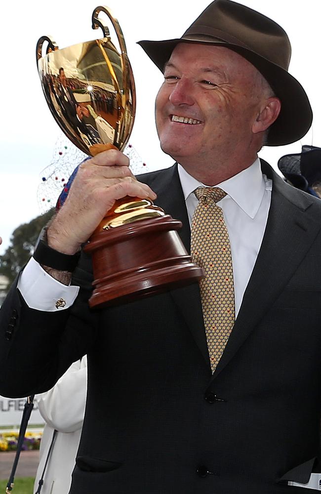 Trainer David Hayes likes the look of his latest trophy. Picture: AAP