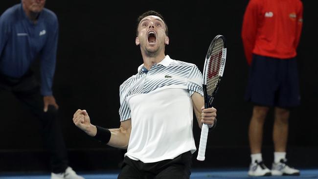 Spain's Roberto Bautista Agut celebrates hia epic victory. Picture: Getty