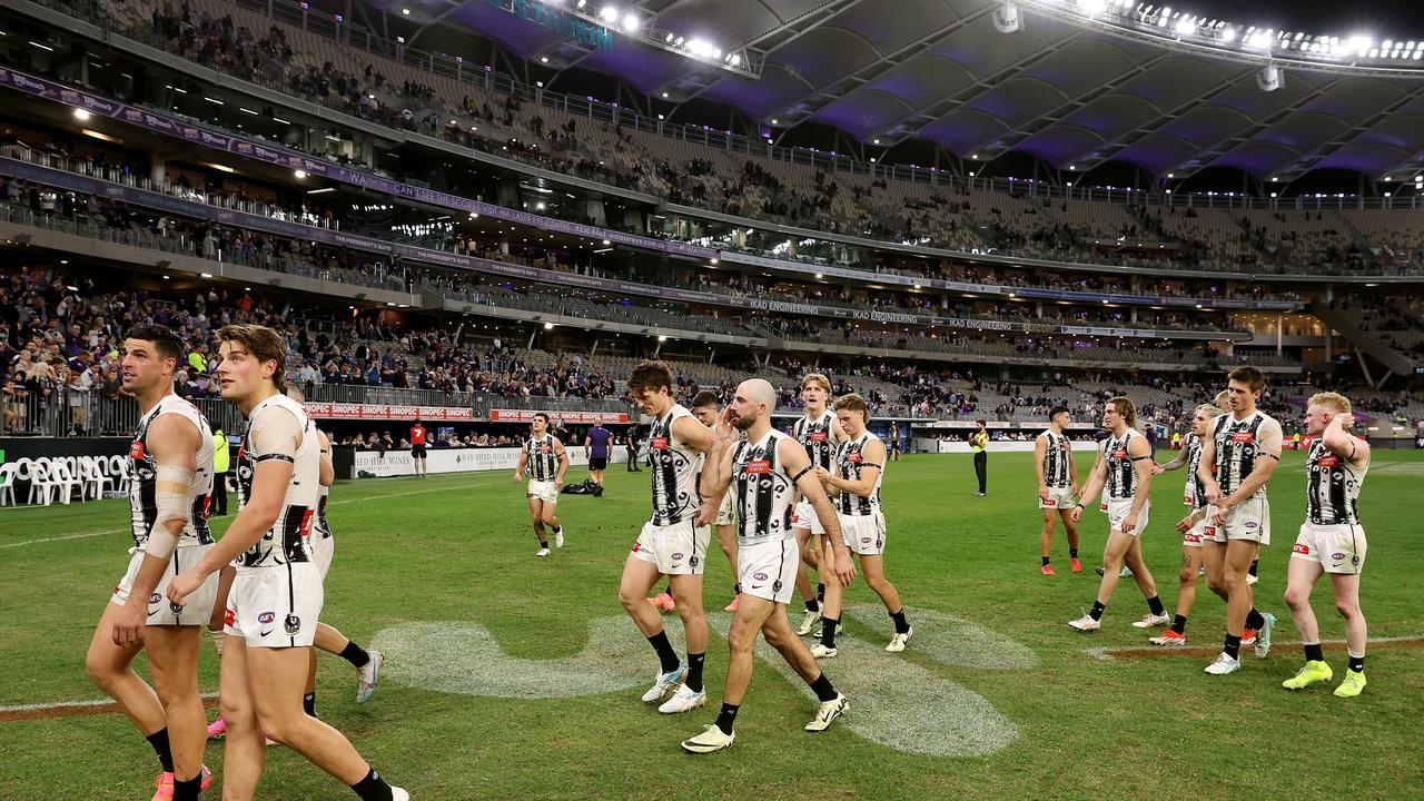 PERTH, AUSTRALIA - MAY 24: Collingwood leave the field after the draw during the 2024 AFL Round 11 match between Walyalup (Fremantle) and the Collingwood Magpies at Optus Stadium on May 24, 2024 in Perth, Australia. (Photo by Will Russell/AFL Photos via Getty Images)