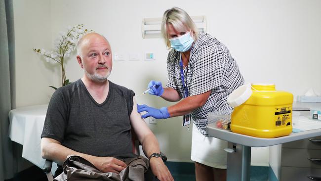 Director of Public Health Doctor Mark Veitch with clinical nurse consultant Nikki Lane at the Roy Fagan Centre in Hobart. First Tasmanians to be given the AstraZeneca vaccination against COVID-19. Picture: Nikki Davis-Jones