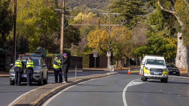 Emergency services at the scene on Belair Rd, Torrens Park. Picture: NewsWire / Ben Clark