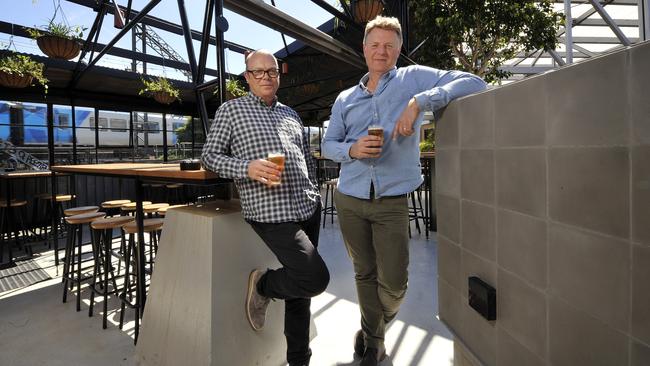 Corner Hotel owners Matt Everitt and Tim Northeast on the refurbished rooftop beer garden in 2016. Picture: Nicki Connolly