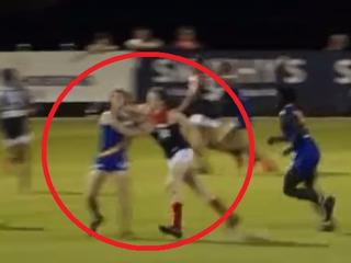 Ben Brown elbows an opponent in the VFL.