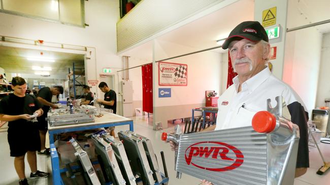 PWR boss Kees Weel with a cooling system at his ASX-listed company PWR Performance Products at Ormeau. Picture: Mike Batterham