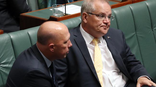 Scott Morrison with Peter Dutton in the House of Representatives. Picture: Gary Ramage.