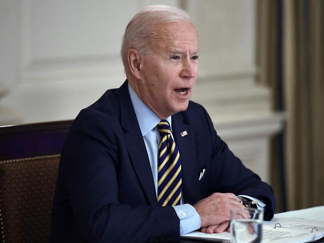 US President Joe Biden speaks during a virtual meeting with members of the Quad alliance of Australia, India, Japan and the US, in the State Dining Room of the White House. Picture: AFP