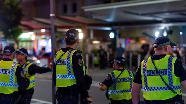 Mitchell St in Darwin was abuzz to celebrate the end of 2020. There was a visible police presence along the party strip. Picture: Che Chorley