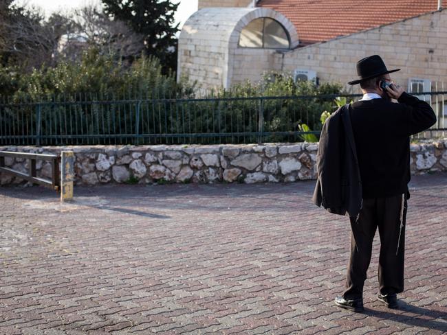 An ultra-Orthodox Jew outside the Central Synagogue in Emmanuel.