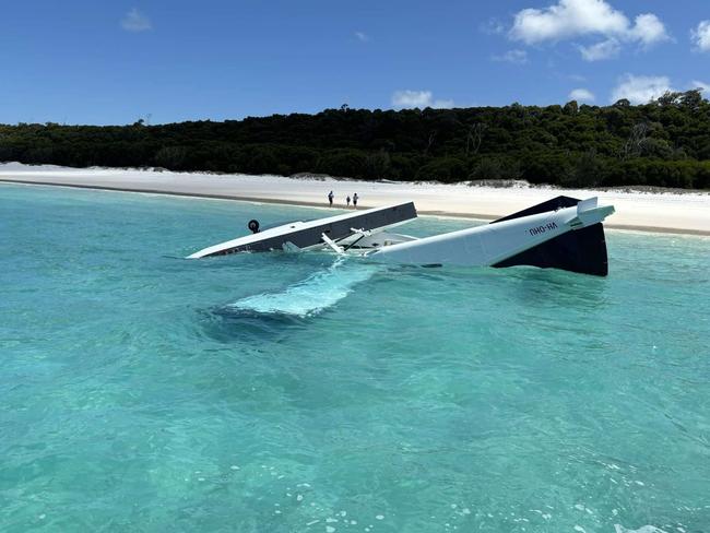 A Whitsunday Air Services plane crashed into waters off world-famous Whitehaven Beach with five people, a pilot and four passengers, on board. Picture supplied by Island FM Whitsundays