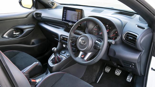 Despite some hard plastics, the Toyota GR Yaris Rallye has a reasonable features list including dual-zone climate control, JBL stereo, heated seats and a seven-inch screen with Apple CarPlay/Android Auto and satnav.