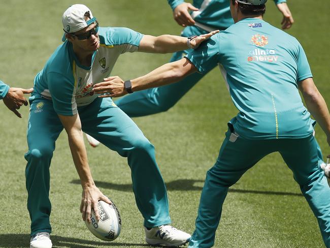 Steve Smith warms up with a game of touch footy. Picture: Getty Images