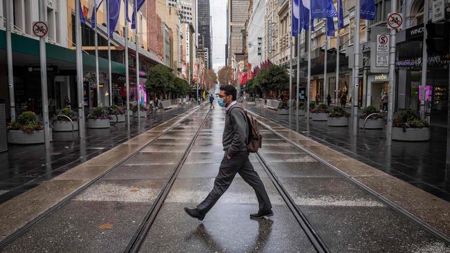 A near-empty Bourke Street in Melbourne on Thursday. Picture: Jake Nowakowski