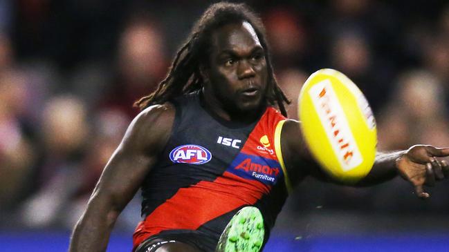 DANGER MAN: Essendon’s Anthony McDonald-Tipungwuti snaps a goal during his matchwinning performance against North Melbourne last week. Picture: MICHAEL DODGE (Getty Images).