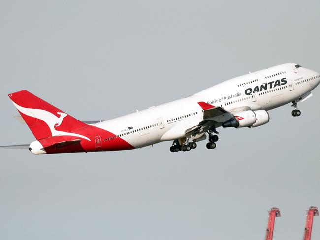 Pictured from Brighton Le Sands is the Qantas 747 plane VH-OEJ as it departs Sydney for the last time.Picture: Christian Gilles