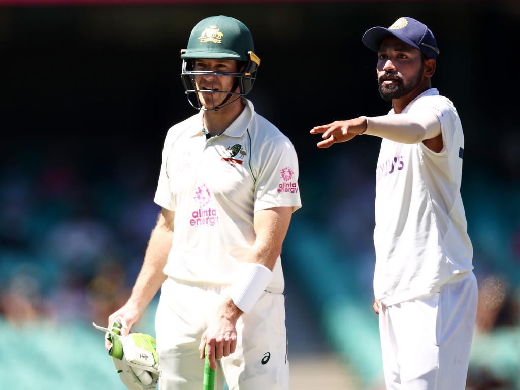 Mohammed Siraj points out the alleged offenders to Tim Paine. (Photo by Cameron Spencer/Getty Images)