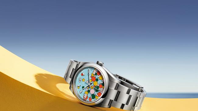 Rolex Oyster Perpetual featuring colourful bubbles and emojis printed on the dial.​