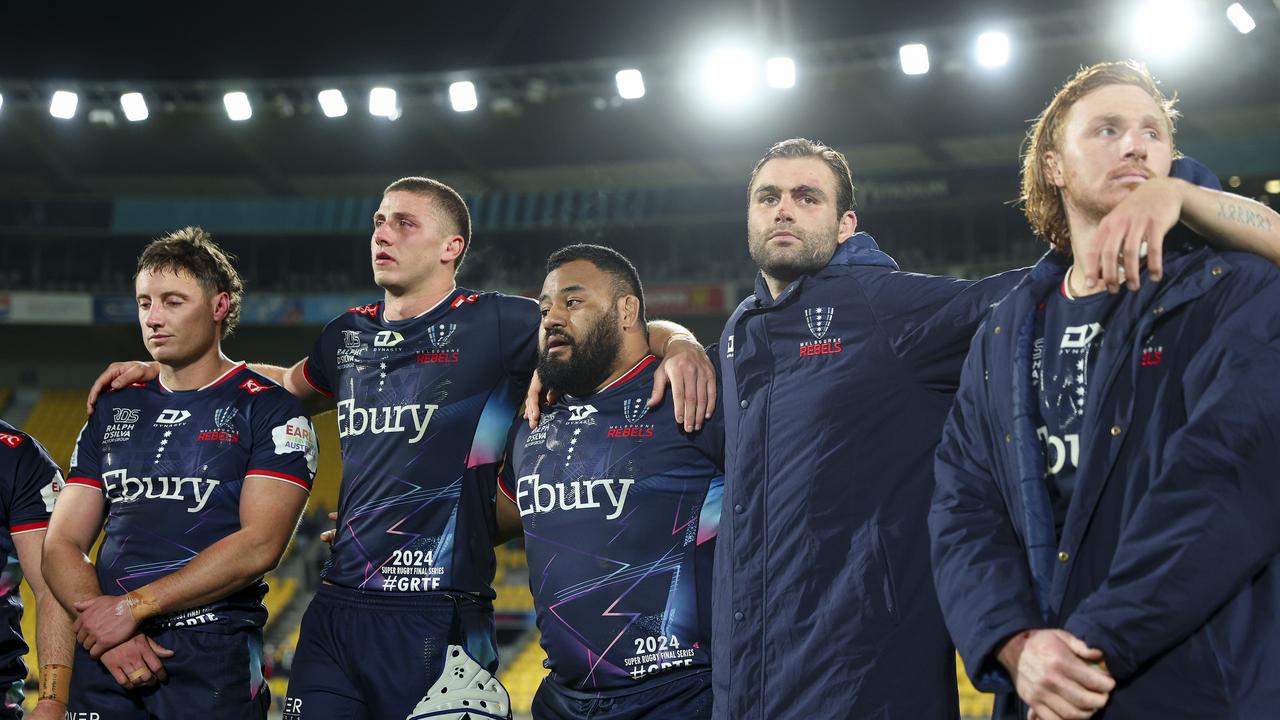 WELLINGTON, NEW ZEALAND - JUNE 08: Rebels players form a huddle after the Super Rugby Pacific Quarter Final match between Hurricanes and Melbourne Rebels at Sky Stadium, on June 08, 2024, in Wellington, New Zealand. (Photo by Hagen Hopkins/Getty Images)