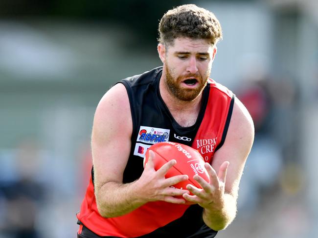 Jacob Chahine of Riddell marks during the round two RDFNL Bendigo Bank Seniors match between Riddell and Kyneton at Riddells Creek Recreation Reserve, on April 13,2024, in Diggers Rest, Australia. (Photo by Josh Chadwick)