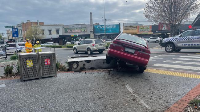 A woman in her 20s has been taken to hospital after a car mounted the footpath and damaged a shop front before knocking her to the ground in West Gippsland on Thursday, September 26, 2024. Picture: Jack Colantuono