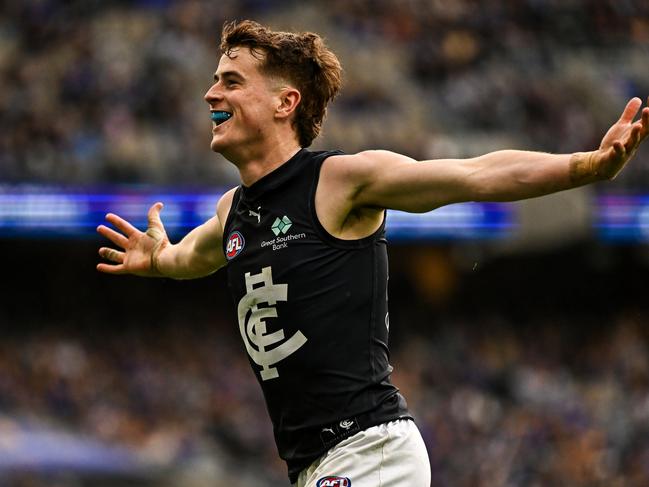 Jaxon Binns celebrates his first goal in AFL football. Picture: Daniel Carson/AFL Photos via Getty Images.