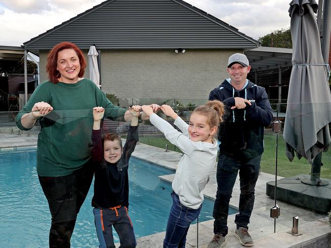 SATURDAY TELEGRAPH - Western Sydney's next top growth suburbs will including St Marys. Locals Scott and Kelly Watson with kids Riley 8 and Trey 6 with their house they've just put on the market. Picture: Toby Zerna