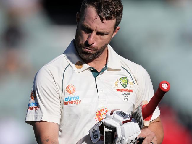 ADELAIDE, AUSTRALIA - DECEMBER 19: Matthew Wade of Australia walks off the field after being run out on 33 runs during day three of the First Test match between Australia and India at Adelaide Oval on December 19, 2020 in Adelaide, Australia. (Photo by Daniel Kalisz/Getty Images)