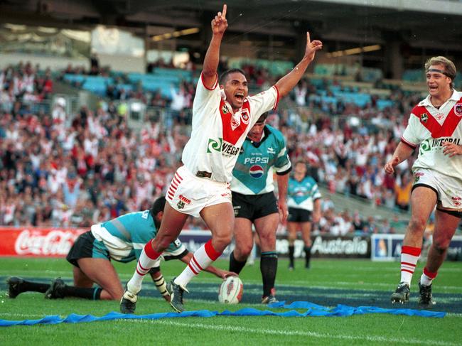 Anthony Mundine celebrates scoring his third try against the Sharks in the preliminary final in 1999.