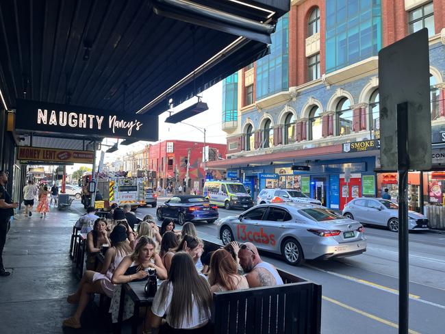 Emergency services swarm to an incident as night life kicks off. Picture: Grace Frost