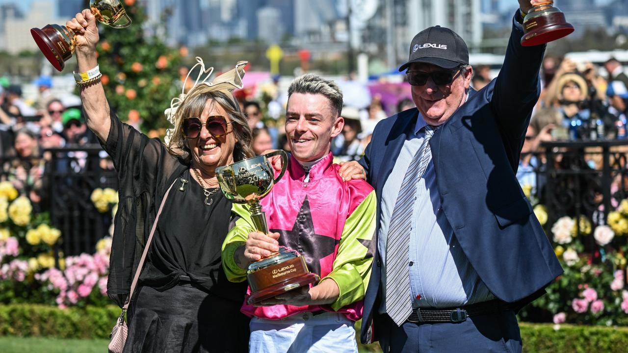 Sheila Laxon celebrates with jockey Robbie Dolan and training partner John Symons. Picture: Reg Ryan/Racing Photos via Getty Images