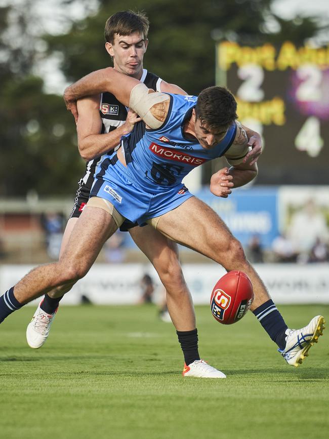 Wilson wrestles with Port Adelaide’s Taj Schofield earlier this season. Picture: Matt Loxton