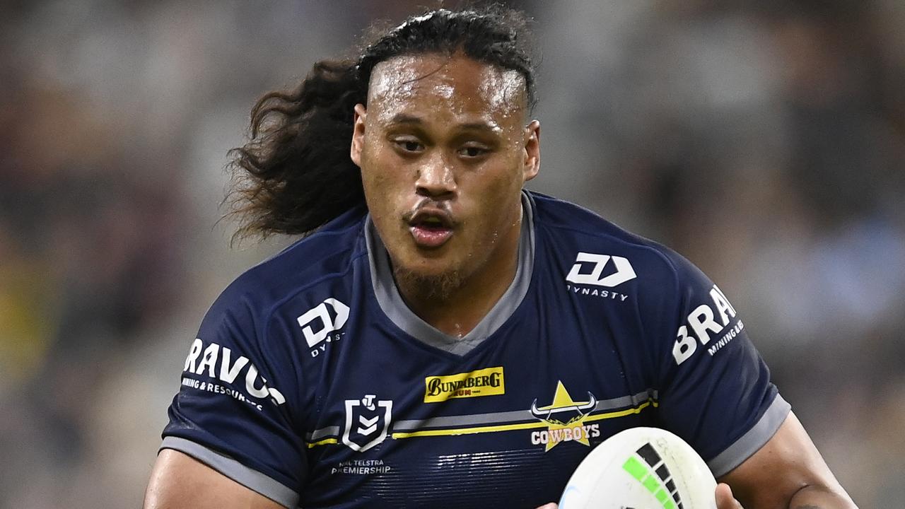 TOWNSVILLE, AUSTRALIA - JULY 15: Luciano Leilua of the Cowboys runs the ball during the round 18 NRL match between the North Queensland Cowboys and the Cronulla Sharks at Qld Country Bank Stadium, on July 15, 2022, in Townsville, Australia. (Photo by Ian Hitchcock/Getty Images)