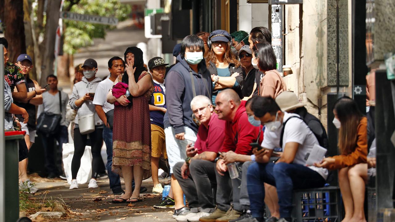 Lines outside Centrelink snaked around blocks when job losses compounded the need for welfare support. Picture: Sam Ruttyn