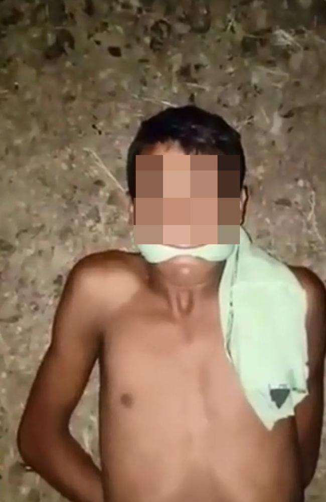 Gagged, bound and terrified the teenage boy lies on his back in the dirt somewhere in Venezuela before his execution with a machete.