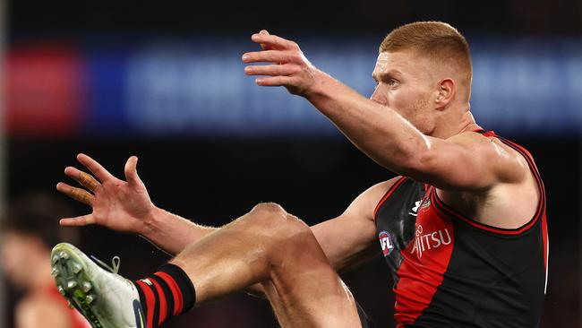 Peter Wright kicks a goal for Essendon during his Crichton Medal campaign.