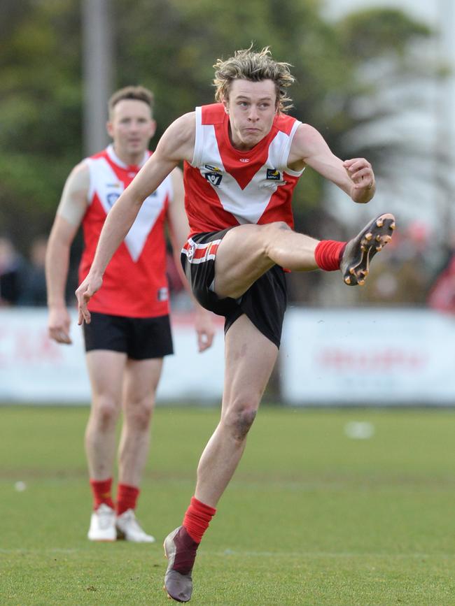 Jonathon Ross slots a goal.