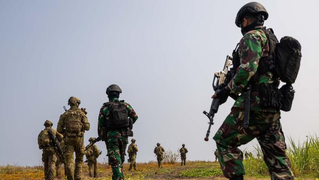 File photo of Australian Army soldiers with Indonesian National Armed Forces personnel. Picture: CPL Janet Pan