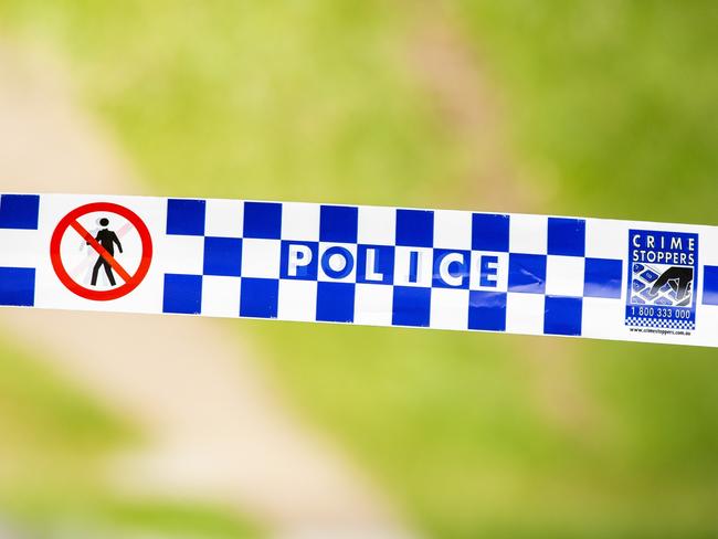 General photograph of Queensland Police and Crime Stoppers tape at crime scene, Sunday, March 8, 2020 (AAP Image/Richard Walker)