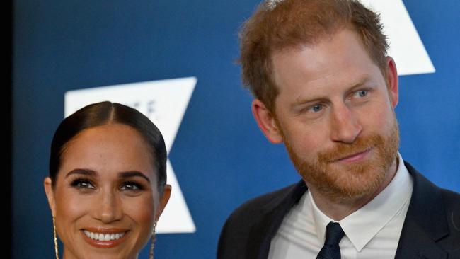 (FILES) Prince Harry, Duke of Sussex, and Meghan, Duchess of Sussex, arrive at the 2022 Robert F. Kennedy Human Rights Ripple of Hope Award Gala at the Hilton Midtown in New York City on December 6, 2022. Prince Harry and wife Meghan Markle were involved in a "near catastrophic car chase" involving paparazzi in New York late on May 16, 2023, a spokesperson for the couple said May 17. "This relentless pursuit, lasting over two hours, resulted in multiple near collisions involving other drivers on the road, pedestrians and two NYPD officers," the spokesperson added. (Photo by ANGELA WEISS / AFP)