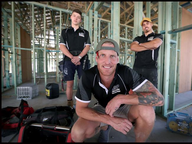 Sunday Mail: apprentice Brandon Marcinkowski Matt Neave and apprentice Bradley Weyman .  A new survey of about 1000 tradies has found 75 per cent of tradies feel their school didnÕt support them in doing a trade. We are after some pics of experienced tradie Matt Neave with one of his apprentices, who will be talking about their experiences in the story. Pic Jamie Hanson