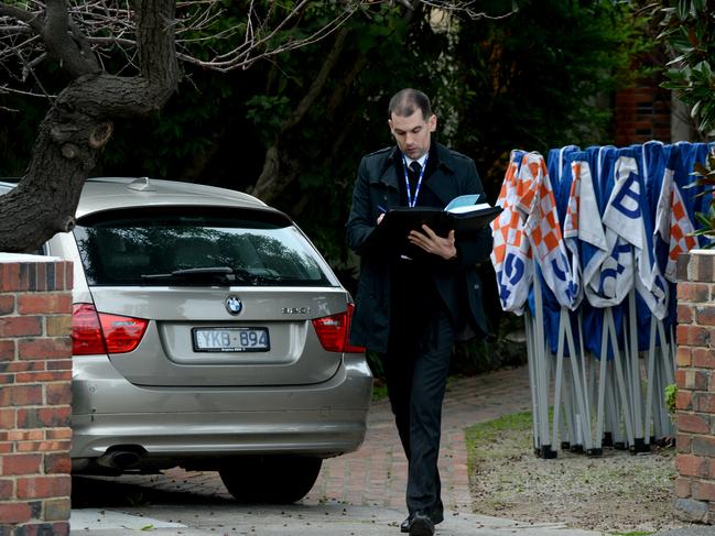 Detectives at the scene in Brighton. Picture: Andrew Henshaw